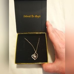 Aphrodite's heart shaped necklace. Sterling silver. Comes with Grogu note